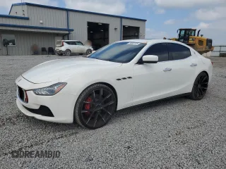2015 Maserati Ghibli with VIN ZAM57XSA7F1145308, listed as a Copart auction lot 56481125 with 105,891 mi miles and Salvage title. Bid and sale history available at DreamBid. Image 1.