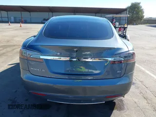 2014 Tesla Model S 60 with VIN 5YJSA1S10EFP32851, listed as a IAAI auction lot 41730746 with 91,657 mi miles and . Bid and sale history available at DreamBid. Image 16.