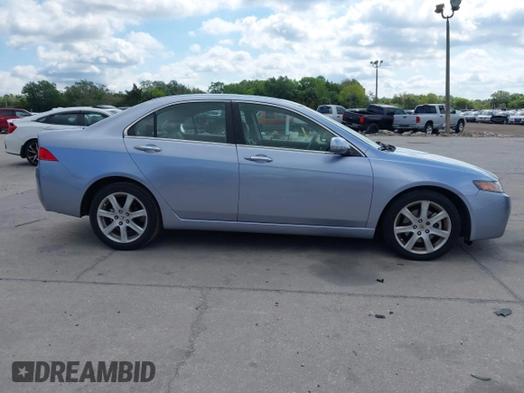 2004 Acura TSX w/Navigation with VIN JH4CL96944C045735, listed as a IAAI auction lot 42042197 with 197,900 mi miles. Bid and sale history available at carsss.com. Image 13.