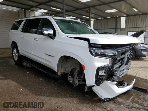 2023 Chevrolet Suburban Premier with VIN 1GNSKFKD8PR543891, listed as a Copart auction lot 53661735 with 34,857 mi miles and Salvage Title. Bid and sale history available at DreamBid. Image 4.