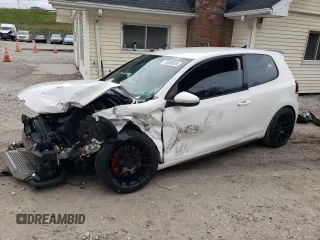 2011 Volkswagen GTI w/Sunroof z VIN WVWFV7AJ0BW038971, wystawiony jako Copart lot #73299924 z przebiegiem Nie podano mil oraz Szkoda całkowita • Salvage title. Historia ofert i sprzedaży dostępna na DreamBid. Obrazek 1.