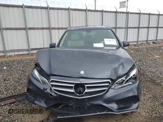 2014 Mercedes-Benz E 350 Sport with VIN WDDHF5KB7EA779952, listed as a IAAI auction lot 42308290 with 100,000 mi miles and . Bid and sale history available at DreamBid. Image 6.