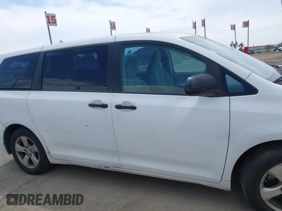 2011 Toyota Sienna with VIN 5TDZK3DCXBS011806, listed as a IAAI auction lot 41999946 with 219,907 mi miles. Bid and sale history available at carsss.com. Image 12.