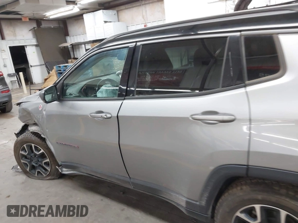 2020 Jeep Compass Trailhawk with VIN 3C4NJDDB7LT203447, listed as a IAAI auction lot 42637452 with 113,896 mi miles and . Bid and sale history available at DreamBid. Image 14.