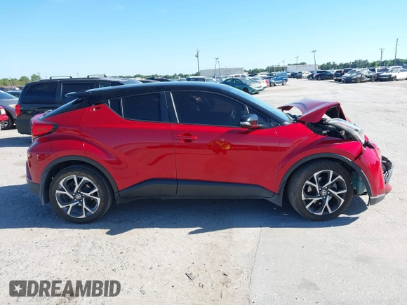 2020 Toyota C-HR LE with VIN JTNKHMBX3L1066720, listed as a IAAI auction lot 42042139 with 98,925 mi miles and . Bid and sale history available at DreamBid. Image 13.