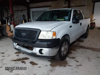 2007 Ford F-150 STX with VIN 1FTRX12W87FB37995, listed as a IAAI auction lot 42186007 with 228,249 mi miles and . Bid and sale history available at DreamBid. Image 2.