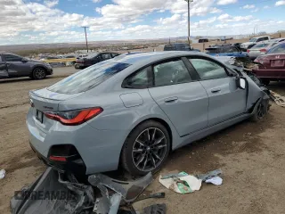 2022 BMW 4 Series M440i xDrive with VIN WBA13AW0XNFM27700, listed as a Copart auction lot 48406425 with Not provided miles and Salvage title. Bid and sale history available at DreamBid. Image 3.