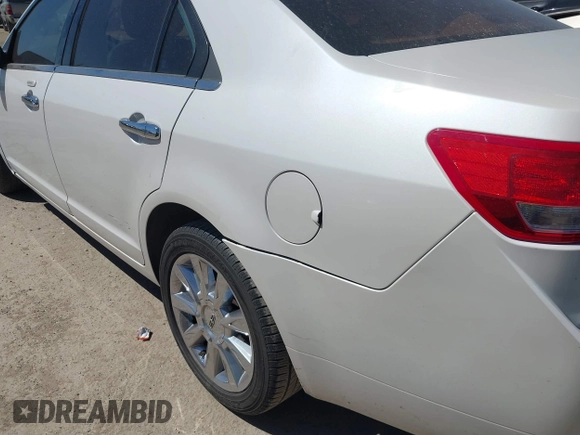 2012 Lincoln MKZ with VIN 3LNHL2GC2CR813653, listed as a IAAI auction lot 41751793 with 216,961 mi miles and . Bid and sale history available at DreamBid. Image 12.