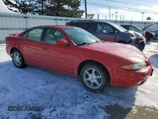 2000 Oldsmobile Alero GLS z VIN 1G3NF52E0YC317362, wystawiony jako Copart lot #48044785 z przebiegiem 169 718 mil mil oraz Szkody całkowita. Historia ofert i sprzedaży dostępna na DreamBid. Obrazek 4.