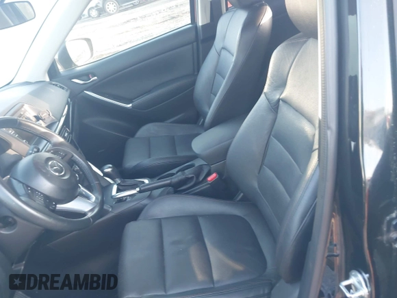 2015 Mazda CX-5 Grand Touring with VIN JM3KE4DY6F0513173, listed as a IAAI auction lot 41867030 with 93,770 mi miles. Bid and sale history available at carsss.com. Image 5.
