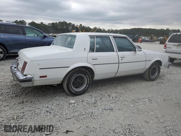 1987 Oldsmobile Cutlass z VIN 1G3GR51Y2HR316707, wystawiony jako Copart lot #69328344 z przebiegiem 70 828 mil mil oraz Szkody całkowita. Historia ofert i sprzedaży dostępna na DreamBid. Obrazek 3.