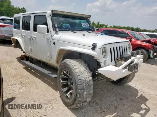 2015 Jeep Wrangler Unlimited Sport with VIN 1C4BJWDG9FL759012, listed as a Copart auction lot 61002465 with 101,395 mi miles and Salvage title. Bid and sale history available at DreamBid. Image 4.