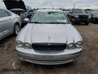 2002 Jaguar X-Type with VIN SAJEA51C02WC20249, listed as a Copart auction lot 69661244 with 97,184 mi miles and Clean Title. Bid and sale history available at carsss.com. Image 5.