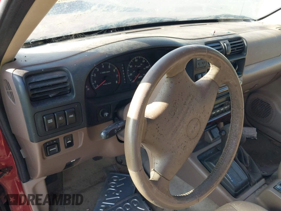 2001 Isuzu Rodeo S with VIN 4S2DM58W814303358, listed as a IAAI auction lot 42695509 with Not provided miles and . Bid and sale history available at DreamBid. Image 7.