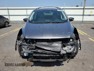2014 Ford Escape Titanium с VIN 1FMCU0J96EUD41199, выставлен на аукционе Copart как лот 59380245 с пробегом 100 319 миль миль и Списание • Salvage title. История ставок и продаж доступна на DreamBid. Изображение 5.