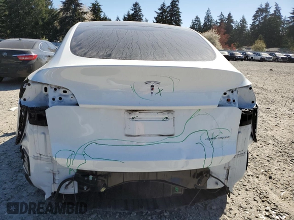 2023 Tesla Model Y Long Range z VIN 7SAYGDEE7PF788932, wystawiony jako Copart lot #52822515 z przebiegiem 33 007 mil mil oraz Szkoda całkowita • Salvage title. Historia ofert i sprzedaży dostępna na DreamBid. Obrazek 6.