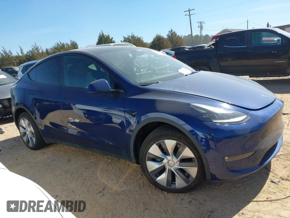 2023 Tesla Model Y Long Range with VIN 7SAYGDEE6PF847890, listed as a IAAI auction lot 41635687 with 32,846 mi miles and . Bid and sale history available at DreamBid. Image 14.