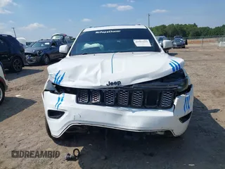 2019 Jeep Grand Cherokee Laredo E with VIN 1C4RJFAG3KC558882, listed as a IAAI auction lot 42567252 with Not provided miles and . Bid and sale history available at DreamBid. Image 13.
