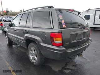 2004 Jeep Grand Cherokee Limited with VIN 1J4GW58N34C399673, listed as a IAAI auction lot 41976505 with 194,005 mi miles. Bid and sale history available at carsss.com. Image 3.