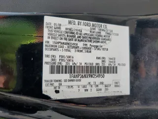 2009 Ford Focus SES with VIN 1FAHP36NX9W254950, listed as a Copart auction lot 70338674 with 197,107 mi miles and Salvage Title. Bid and sale history available at carsss.com. Image 12.