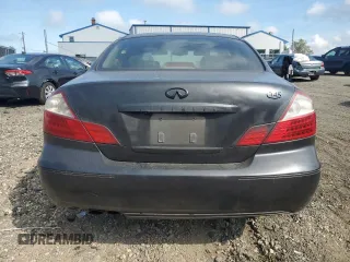 2005 Infiniti Q45 z VIN JNKBF01A45M100941, wystawiony jako Copart lot #71366494 z przebiegiem 117 616 mil mil oraz Czysty tytuł • Clean title. Historia ofert i sprzedaży dostępna na DreamBid. Obrazek 6.