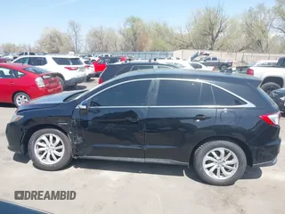 2017 Acura RDX Technology with VIN 5J8TB3H56HL014036, listed as a IAAI auction lot 41980079 with 124,683 mi miles and . Bid and sale history available at DreamBid. Image 14.