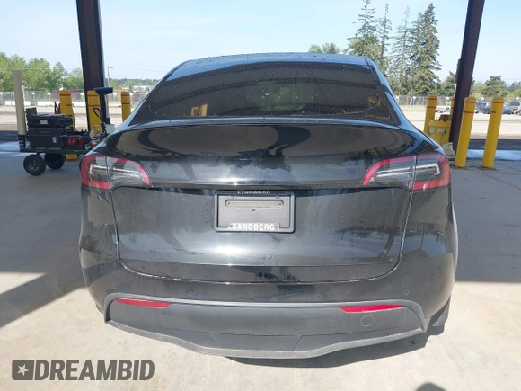 2022 Tesla Model Y Long Range with VIN 7SAYGDEE1NF550202, listed as a IAAI auction lot 42121718 with 28,211 mi miles and . Bid and sale history available at carsss.com. Image 16.