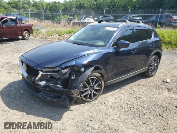 2018 Mazda CX-5 Grand Touring with VIN JM3KFBDM8J0342272, listed as a Copart auction lot 61930115 with 119,727 mi miles and Salvage title. Bid and sale history available at DreamBid. Image 1.