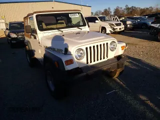2002 Jeep Wrangler SE with VIN 1J4FA29P82P756330, listed as a Copart auction lot 83659574 with 156,901 mi miles and Salvage Title. Bid and sale history available at DreamBid. Image 11.