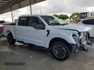 2023 Ford F-150 XL with VIN 1FTEW1CP9PKD19429, listed as a Copart auction lot 58021125 with 13,678 mi miles and Salvage title. Bid and sale history available at DreamBid. Image 4.