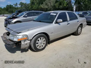 2003 Mercury Grand Marquis LS Premium with VIN 2MEHM75W63X697725, listed as a Copart auction lot 54485505 with 129,194 mi miles and Salvage Title. Bid and sale history available at DreamBid. Image 1.