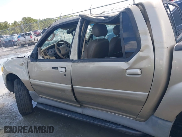 2003 Ford Explorer Sport Trac XLS z VIN 1FMZU77E23UC35868, wystawiony jako IAAI lot #42530211 z przebiegiem 223 483 mil mil oraz . Historia ofert i sprzedaży dostępna na DreamBid. Obrazek 6.