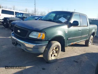 2002 Ford F-150 XLT with VIN 1FTRW08L12KB71710, listed as a IAAI auction lot 41826511 with 1 mi miles. Bid and sale history available at carsss.com. Image 2.