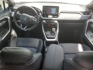 2021 Toyota RAV4 Hybrid XSE with VIN 4T3E6RFV3MU061808, listed as a Copart auction lot 57048025 with 20,614 mi miles and Salvage title. Bid and sale history available at DreamBid. Image 8.