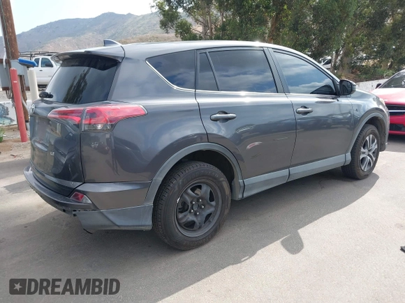 2017 Toyota RAV4 LE with VIN 2T3ZFREV6HW395050, listed as a IAAI auction lot 42136752 with 202,270 mi miles and . Bid and sale history available at carsss.com. Image 4.