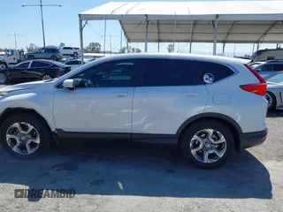 2019 Honda CR-V EX z VIN 5J6RW1H59KA012571, wystawiony jako IAAI lot #41830202 z przebiegiem 49 987 mil mil oraz . Historia ofert i sprzedaży dostępna na DreamBid. Obrazek 15.