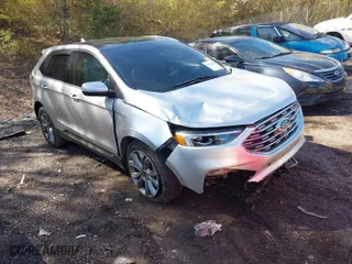 2019 Ford Edge Titanium with VIN 2FMPK3K99KBC02998, listed as a IAAI auction lot 41764680 with 150,338 mi miles. Bid and sale history available at carsss.com. Image 1.