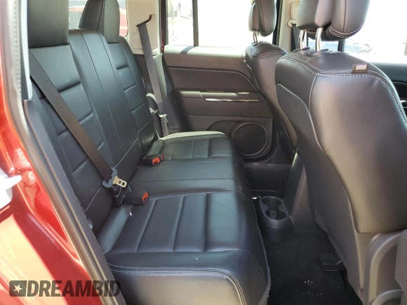 2014 Jeep Patriot Limited with VIN 1C4NJPCB6ED645325, listed as a Copart auction lot 59924305 with 69,705 mi miles and Salvage title. Bid and sale history available at DreamBid. Image 11.