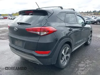 2017 Hyundai Tucson Value with VIN KM8J3CA28HU394750, listed as a IAAI auction lot 41960452 with 138,134 mi miles. Bid and sale history available at carsss.com. Image 4.