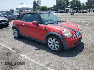 2010 MINI Convertible с VIN WMWMR3C59ATU97966, выставлен на аукционе Copart как лот 59870035 с пробегом 124 132 миль миль и Списание • Salvage title. История ставок и продаж доступна на DreamBid. Изображение 4.