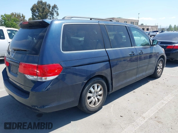 2009 Honda Odyssey EX-L with VIN 5FNRL386X9B409419, listed as a IAAI auction lot 42177197 with 190,827 mi miles. Bid and sale history available at carsss.com. Image 4.