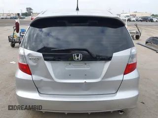 2013 Honda Fit Sport with VIN JHMGE8H58DC003021, listed as a IAAI auction lot 42120318 with 233,056 mi miles. Bid and sale history available at carsss.com. Image 17.