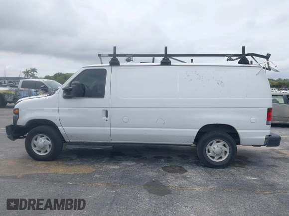 2013 Ford Econoline Cargo Commercial with VIN 1FTNE2EW6DDA10949, listed as a IAAI auction lot 41979346 with 250,952 mi miles and . Bid and sale history available at DreamBid. Image 14.