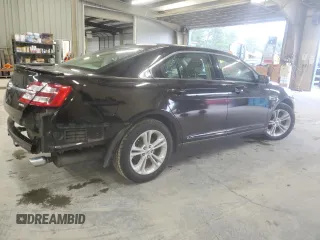 2014 Ford Taurus SEL z VIN 1FAHP2E80EG128686, wystawiony jako Copart lot #57158255 z przebiegiem 69 529 mil mil oraz Szkoda całkowita • Salvage title. Historia ofert i sprzedaży dostępna na DreamBid. Obrazek 3.