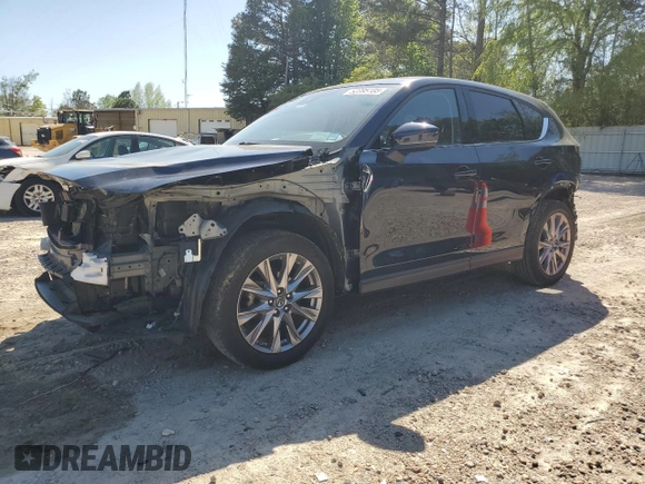2019 Mazda CX-5 Grand Touring with VIN JM3KFBDMXK0540725, listed as a Copart auction lot 52395185 with 33,838 mi miles and Salvage Title. Bid and sale history available at carsss.com. Image 1.