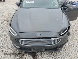 2018 Ford Fusion Hybrid Titanium with VIN 3FA6P0RU8JR176488, listed as a Copart auction lot 47187335 with 102,615 mi miles and Salvage Title. Bid and sale history available at carsss.com. Image 12.
