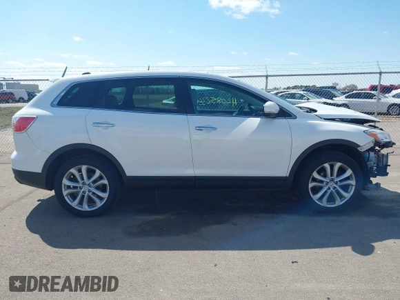 2011 Mazda CX-9 Grand Touring with VIN JM3TB3DA0B0311353, listed as a IAAI auction lot 42085234 with 156,578 mi miles and . Bid and sale history available at DreamBid. Image 13.