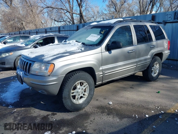 2001 Jeep Grand Cherokee Limited with VIN 1J4GW58N91C688438, listed as a IAAI auction lot 41830334 with 184,420 mi miles. Bid and sale history available at carsss.com. Image 2.