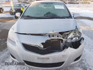 2010 Toyota Yaris with VIN JTDBT4K38A4076168, listed as a IAAI auction lot 41635379 with 156,016 mi miles. Bid and sale history available at carsss.com. Image 12.