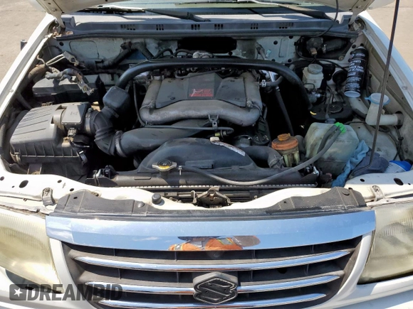 2003 Suzuki XL7 Touring with VIN JS3TY92V334105374, listed as a Copart auction lot 64013375 with 177,939 mi miles and Salvage title. Bid and sale history available at DreamBid. Image 11.